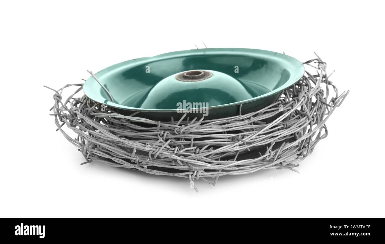 Coil of metal barbed wire isolated on white Stock Photo - Alamy