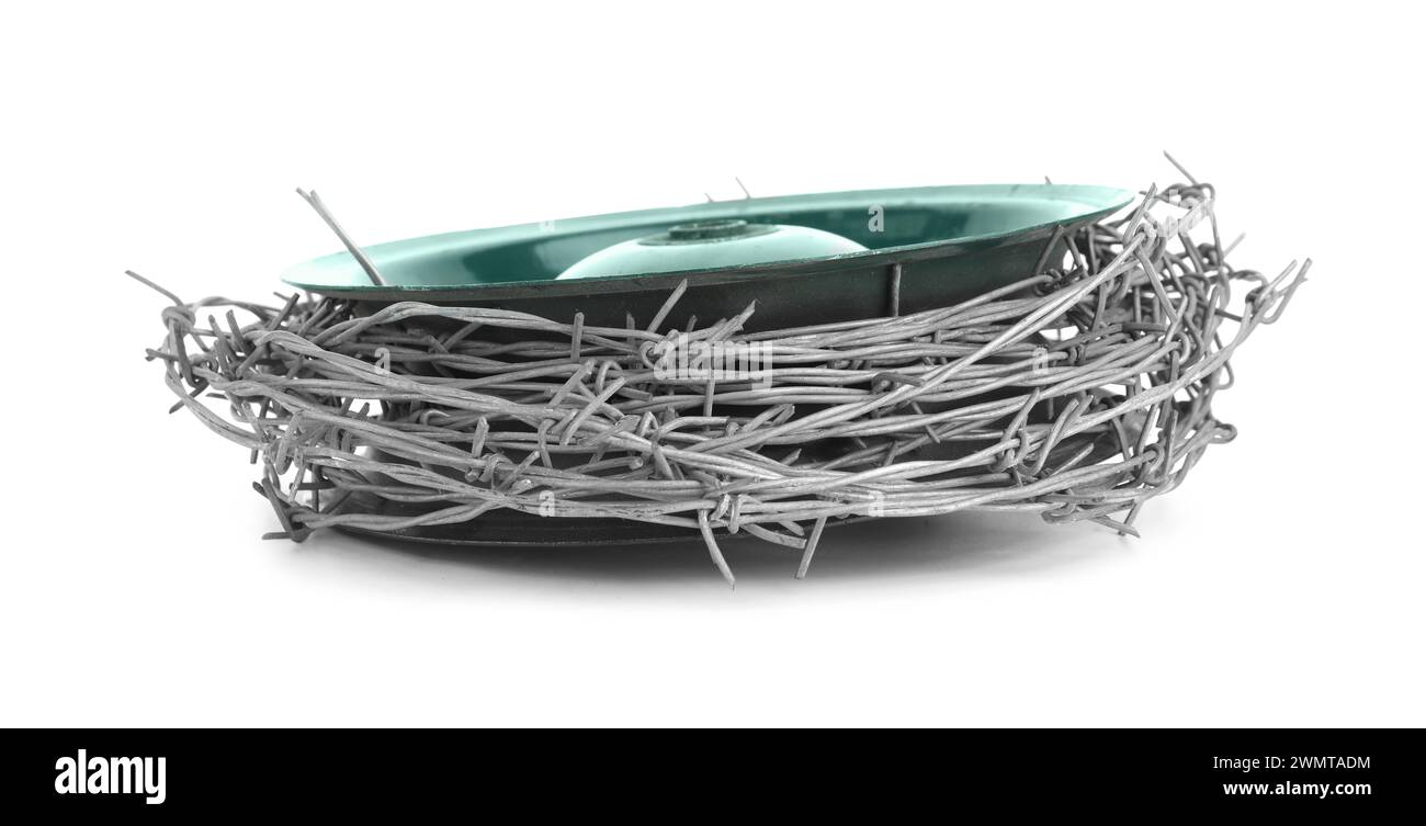 Coil of metal barbed wire isolated on white Stock Photo - Alamy
