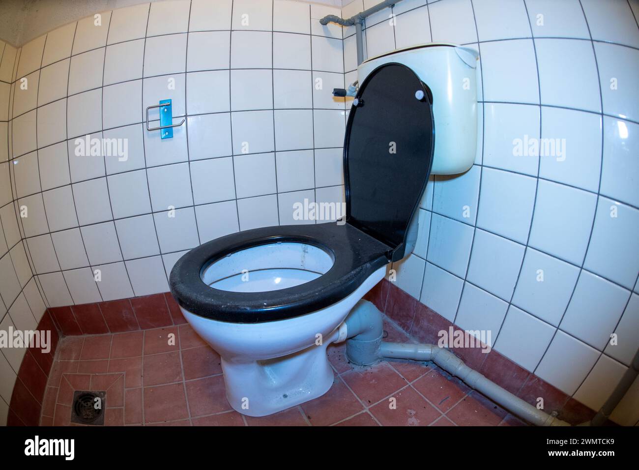 Pasewalk, Germany. 23rd Feb, 2024. A toilet in a GDR bunker in Mecklenburg-Western Pomerania. According to owner Fuhrmann from Torgelow, there are several interested parties for the bunker, which is up for sale. The GDR bunker in Pasewalk is to be sold. Credit: Stefan Sauer/dpa/Alamy Live News Stock Photo