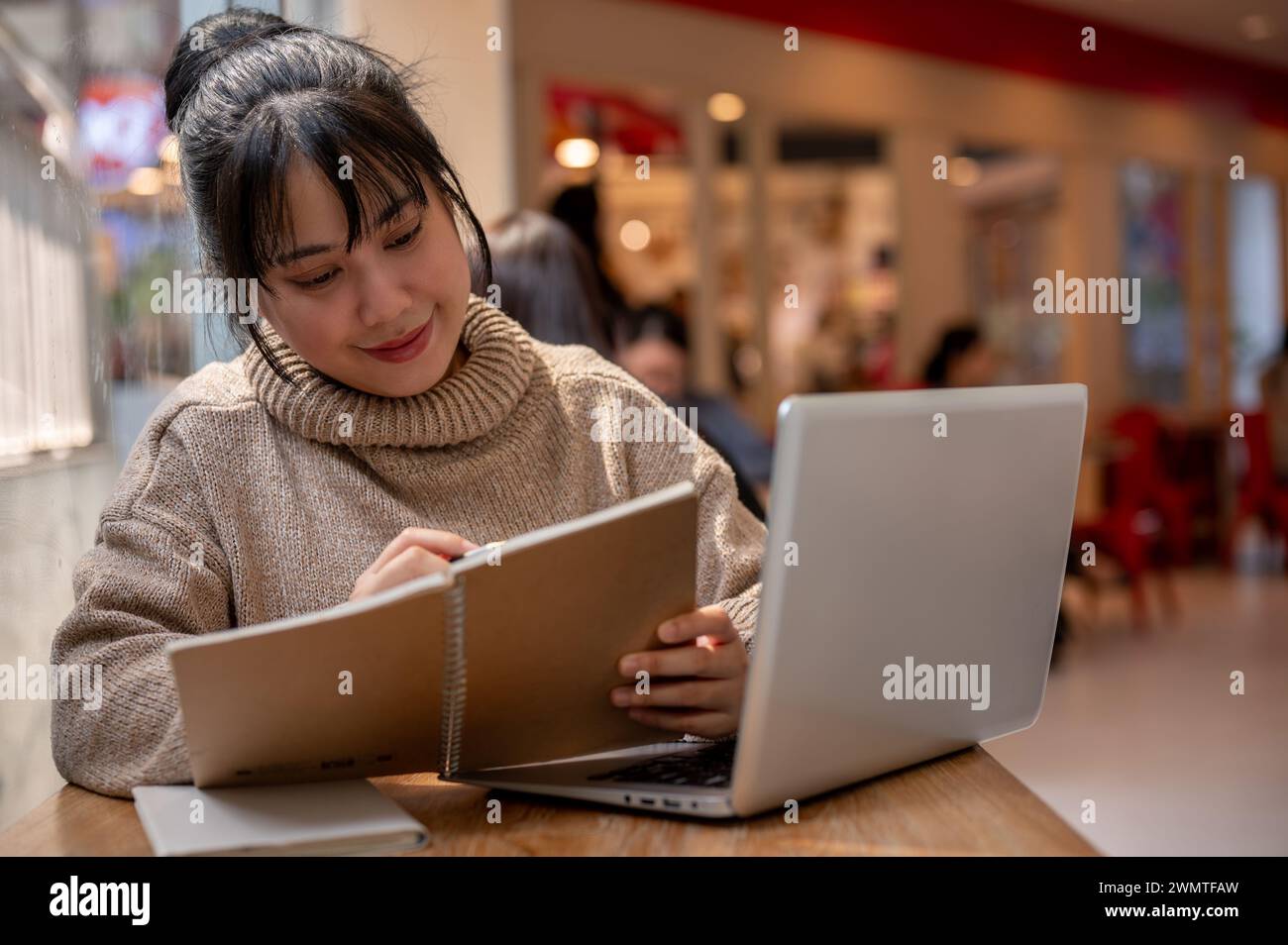 Young happy asian businesswoman multitasking hi-res stock photography ...