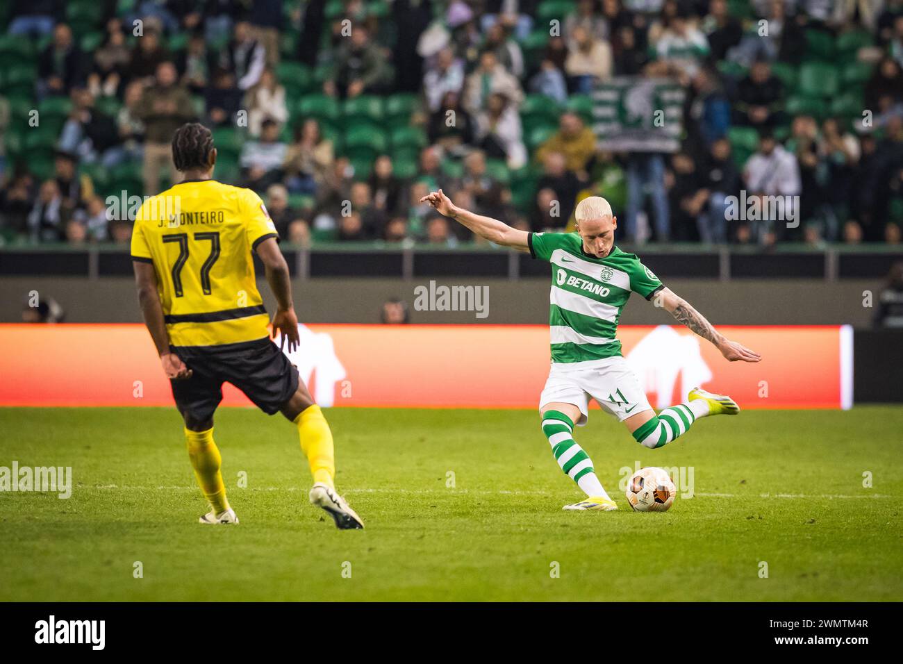 Lisbon, Portugal. 22nd Feb, 2024. Nuno Santos of Sporting CP (R) and Joel Monteiro of BSC Young Boys (L) in action during the UEFA Europa League 2023/24 knockout round play-offs second leg match between Sporting CP and BSC Young Boys at Estadio Jose Alvalade. (Final score: Sporting CP 1 - 1 BSC Young Boys) Credit: SOPA Images Limited/Alamy Live News Stock Photo