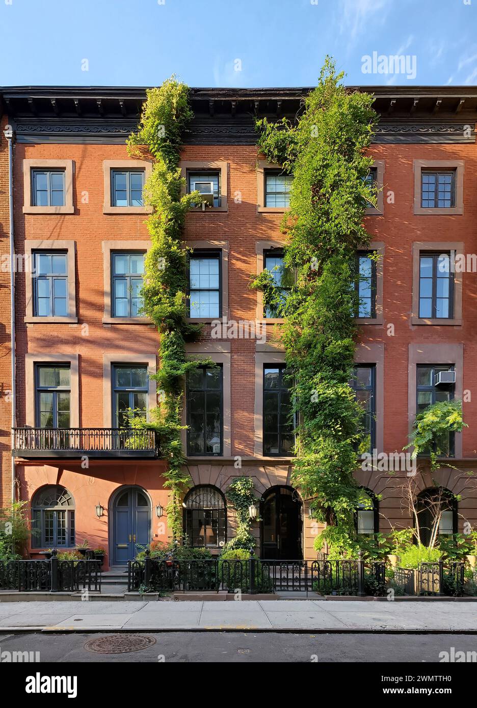 Historic vine covered apartment buildings on 9th Street in the