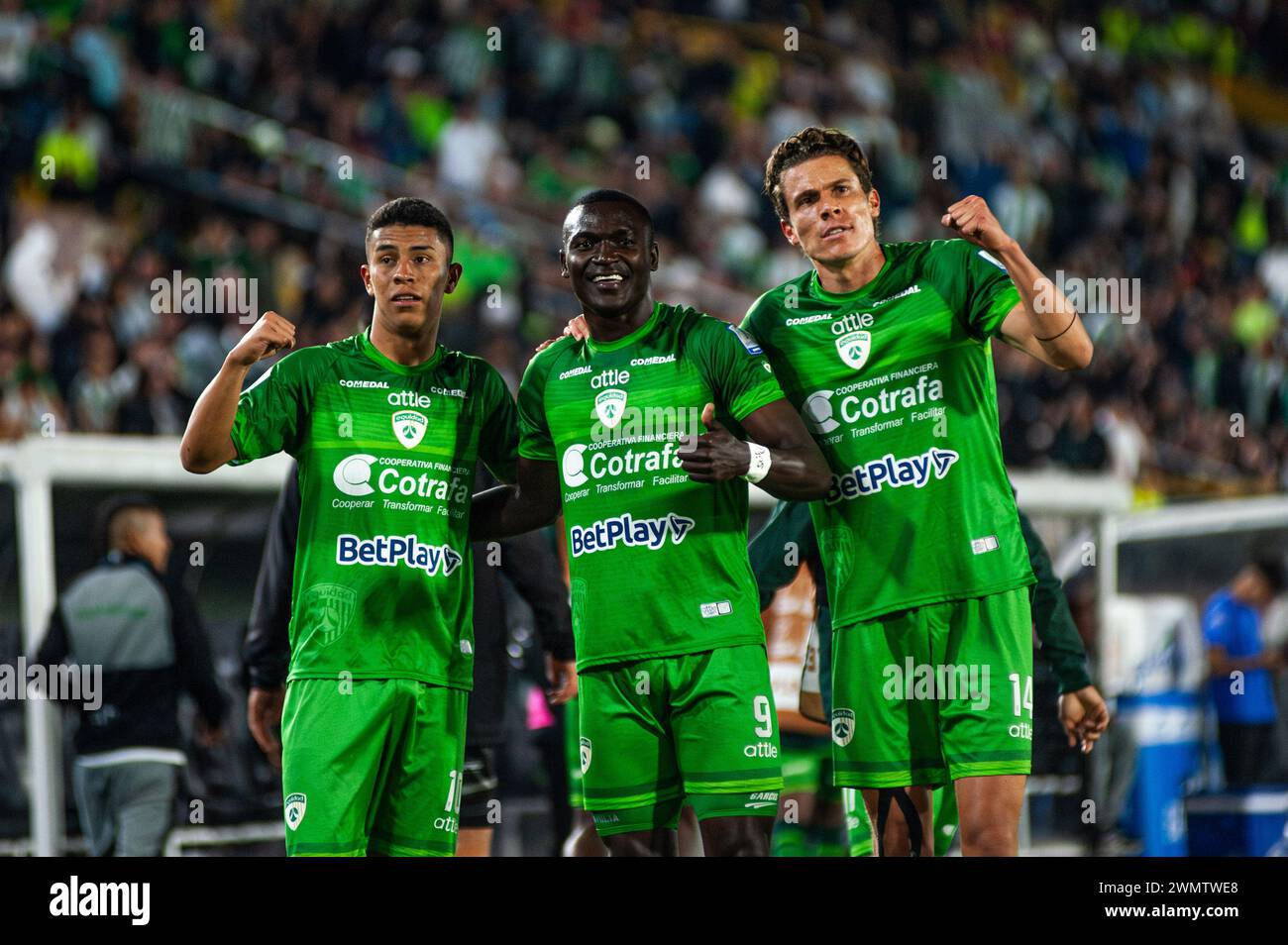 Bogota, Colombia. 25th Feb, 2024. Equidad's Kevin Viveros (C) poses for a photo with Johan Rojas Echavarria (L) and Felipe Acosta (R) after scoring a goal during the BetPlay Dimayor Leagua match between Equidad (2) and Nacional (0) in Bogota, Colombia's El Campin stadium on February 25, 2024. Photo by: Sebastian Barros/Long Visual Press Credit: Long Visual Press/Alamy Live News Stock Photo