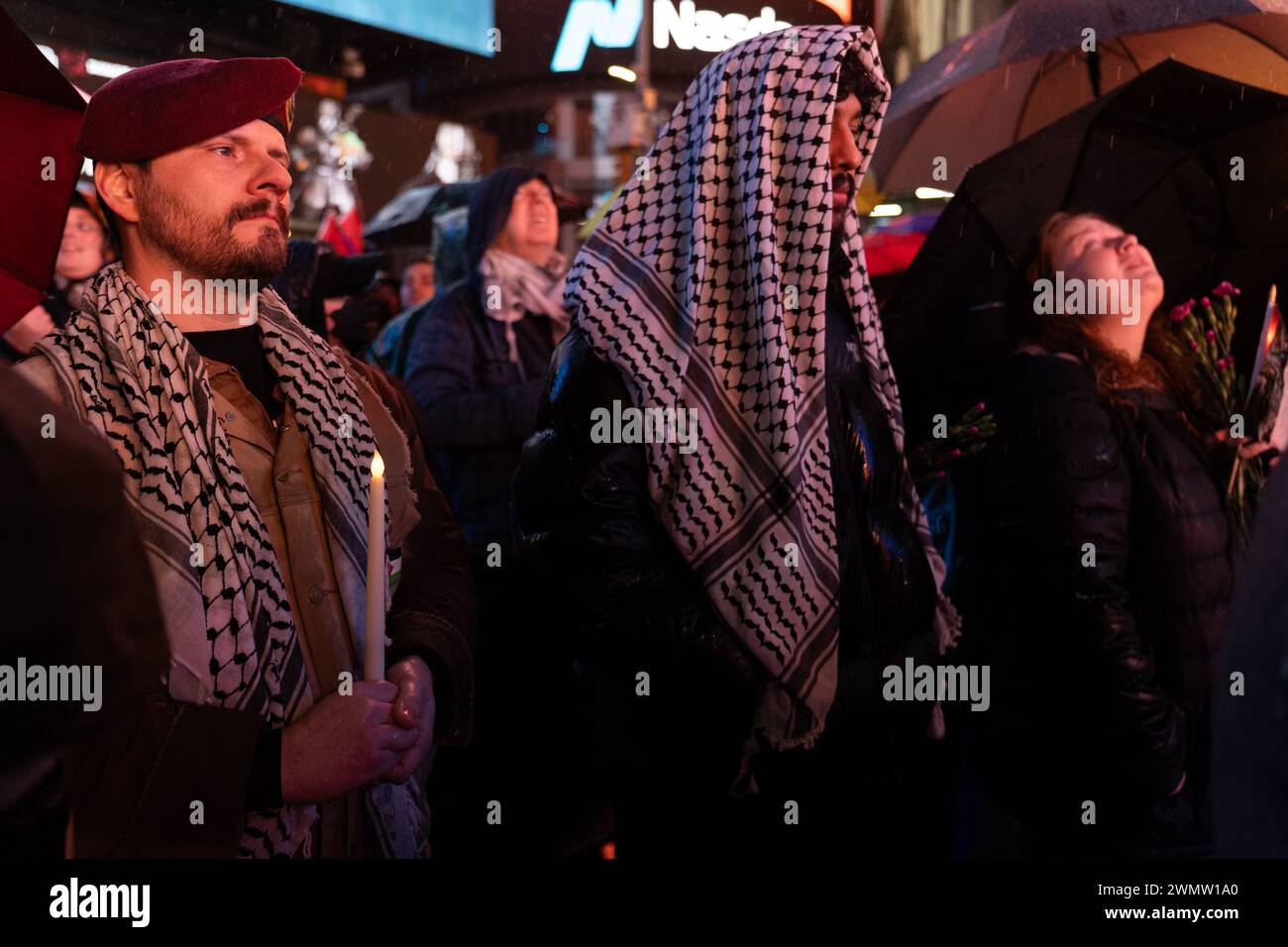 Manhattan, United States. 27th Feb, 2024. A man with a military beret holds a candle at a vigil for US Airman Aaron Bushnell. The member of the US Armed Forces self-immolated outside the Israeli Embassy in Washington, DC on Sunday in protest of the ongoing conflict in Palestine and continued offensive by Israel. (Photo by Derek French/SOPA Images/Sipa USA) Credit: Sipa USA/Alamy Live News Stock Photo