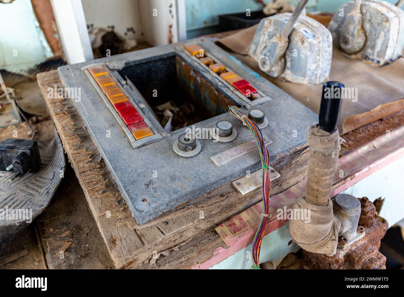 Old, rusty radio communication intercom device at the bridge of a cargo ship run aground on the Al Hamriyah beach in Umm Al Quwain, United Arab Emirat Stock Photo