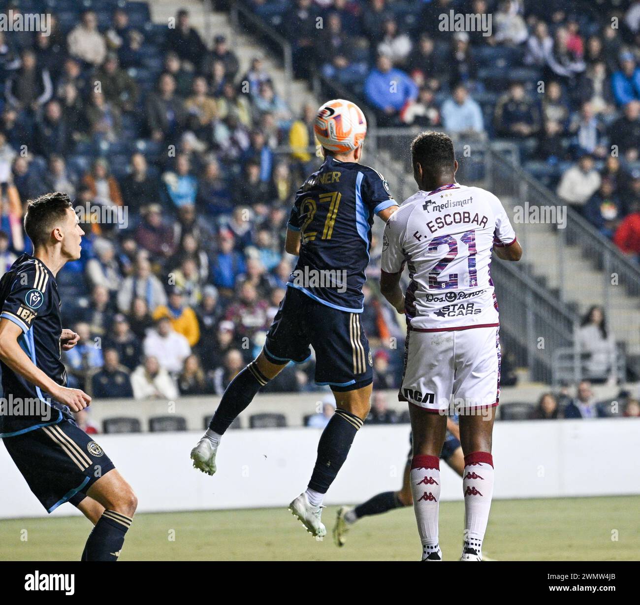 Chester, Pennsylvania, USA. 27th Feb, 2024. February 27, 2024, Chester PA, USA: Deportivo Saprissa player, FIDEL ESCOBAR (21) in action against Philadelphia Union player, KAI WAGNER (27) at the 2024 Concacaf Champions Cup Round One at Subaru Park. The Union won on aggregate points to move into the round of 16. Credit Image: © Ricky Fitchett via ZUMA Wire (Credit Image: © Ricky Fitchett/ZUMA Press Wire) EDITORIAL USAGE ONLY! Not for Commercial USAGE! Stock Photo