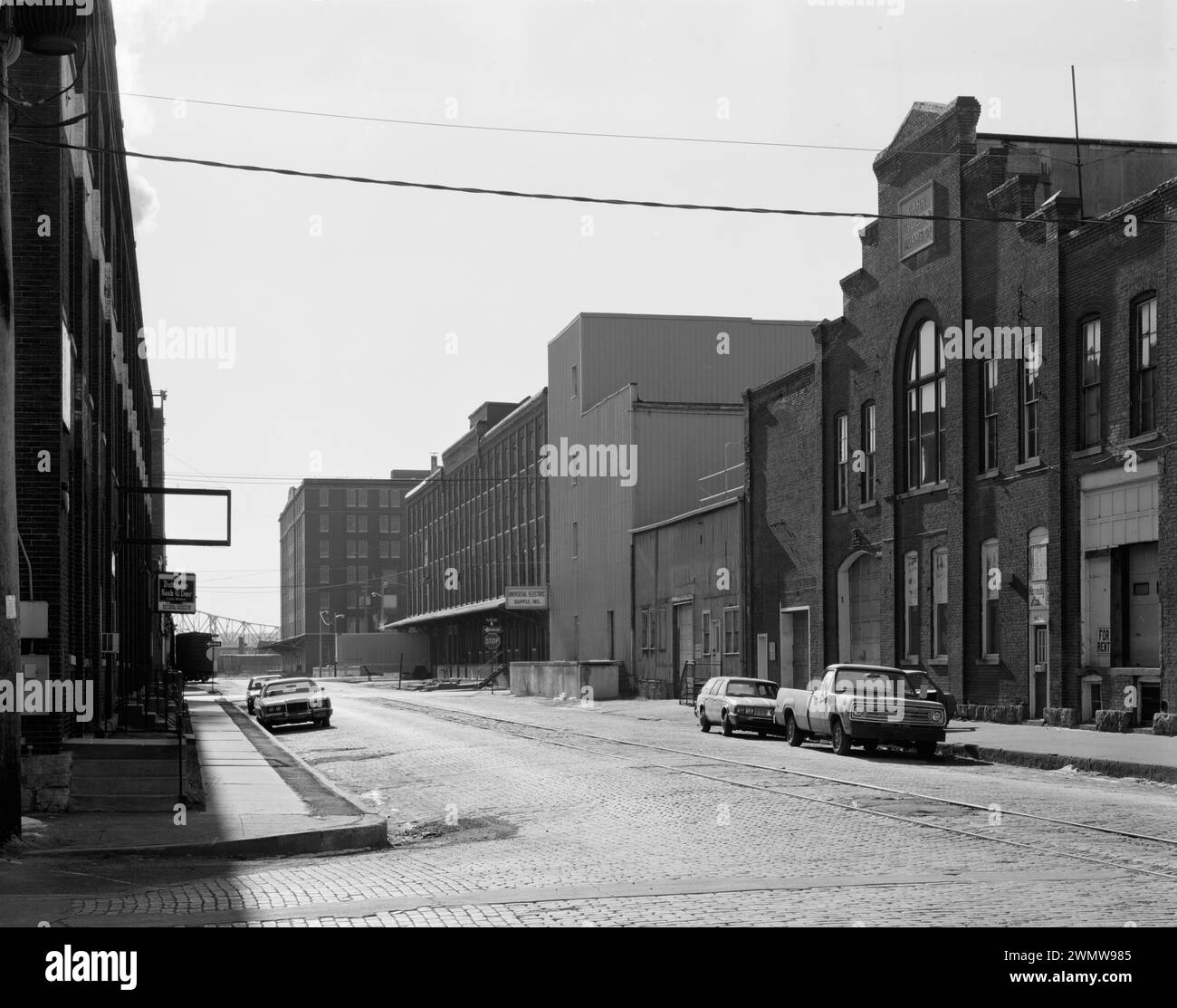 Block of Jackson Street, with Carr, Ryder and Adams Company Powerhouse in right foreground. View to South - Dubuque Commercial & industrial Buildings Stock Photo