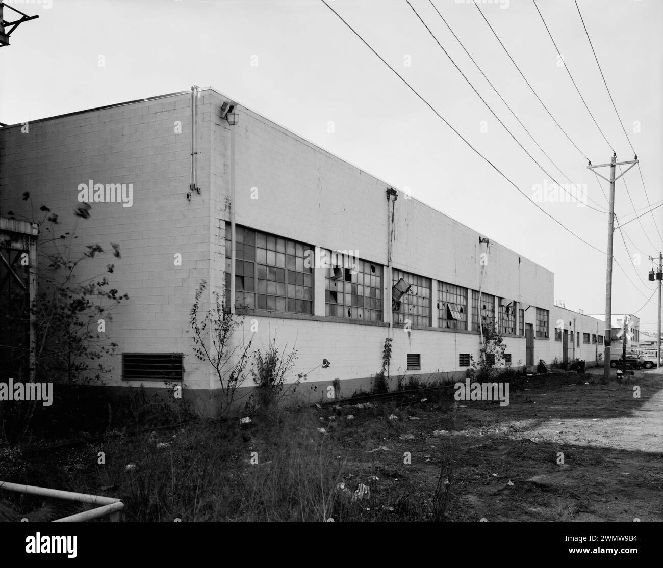Factory Building, with Finished product Warehouse in right background. View to NorthWest - Commercial & industrial Buildings, Maizewood insulation Company Factory, 275 Salina Street, Dubuque Stock Photo