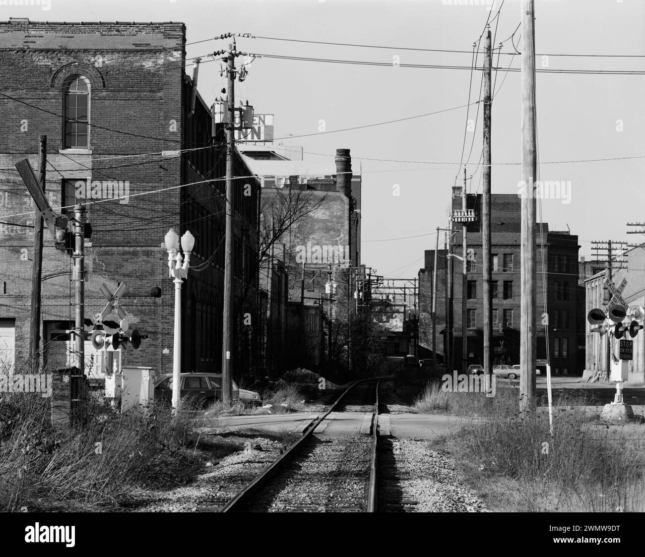 Railroad Spur Track behind 0 Block of Main Street with M.M. Walker Company Warehouse in left foreground. View to North - Dubuque Commercial & industrial Buildings Stock Photo