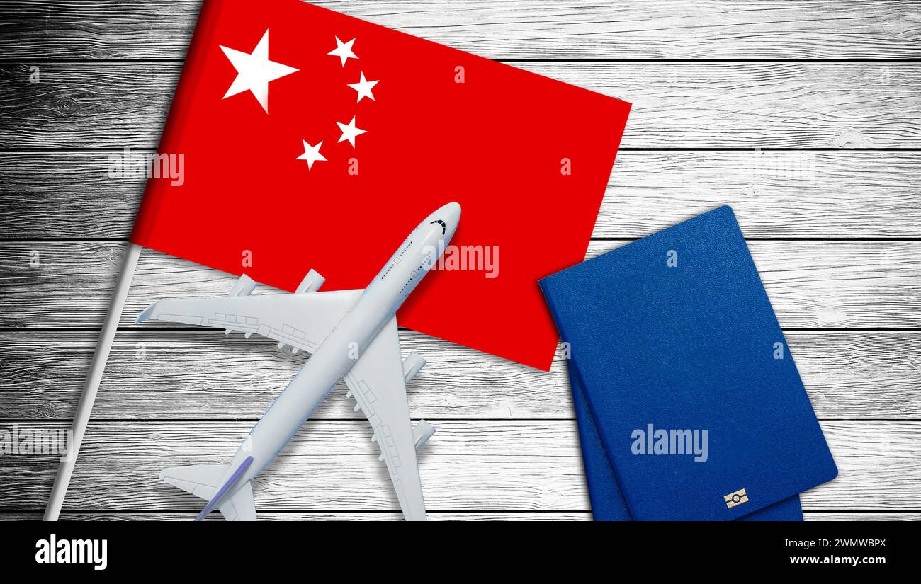 China concept. Chinese flag near passport on white background top-down copy space Stock Photo