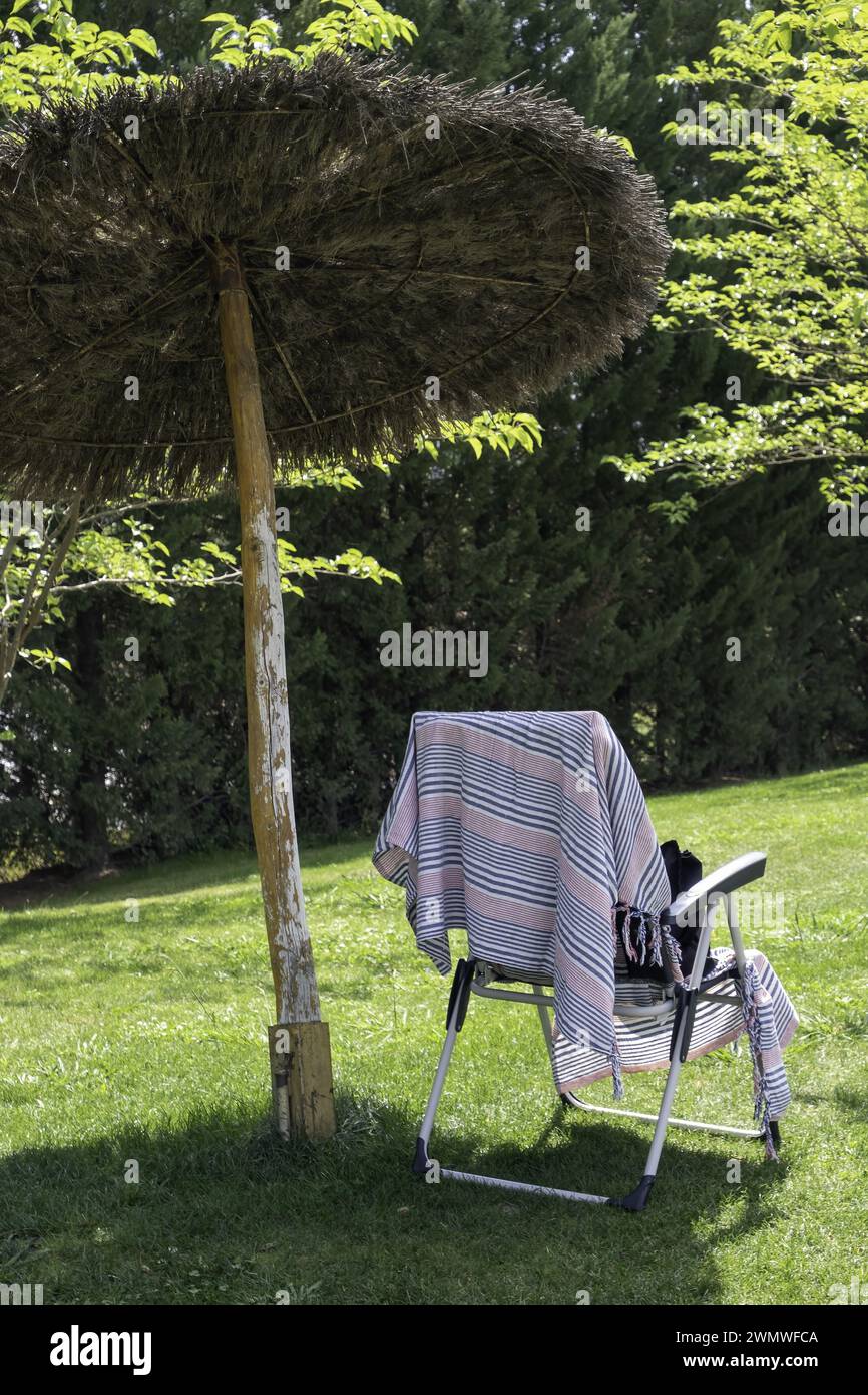 Detail of seat in a resort with swimming pool, vacation and summer Stock Photo