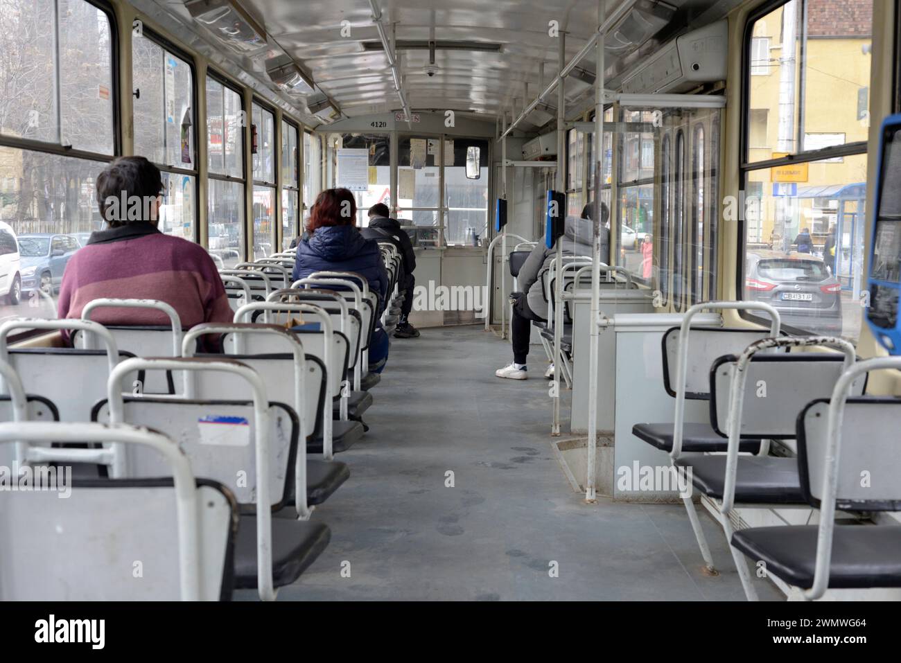 Inside of dated ČKD T6B5 tram showing dull old-fashioned grey interior in use in Sofia, Bulgaria, Eastern Europe, Balkans, EU Stock Photo