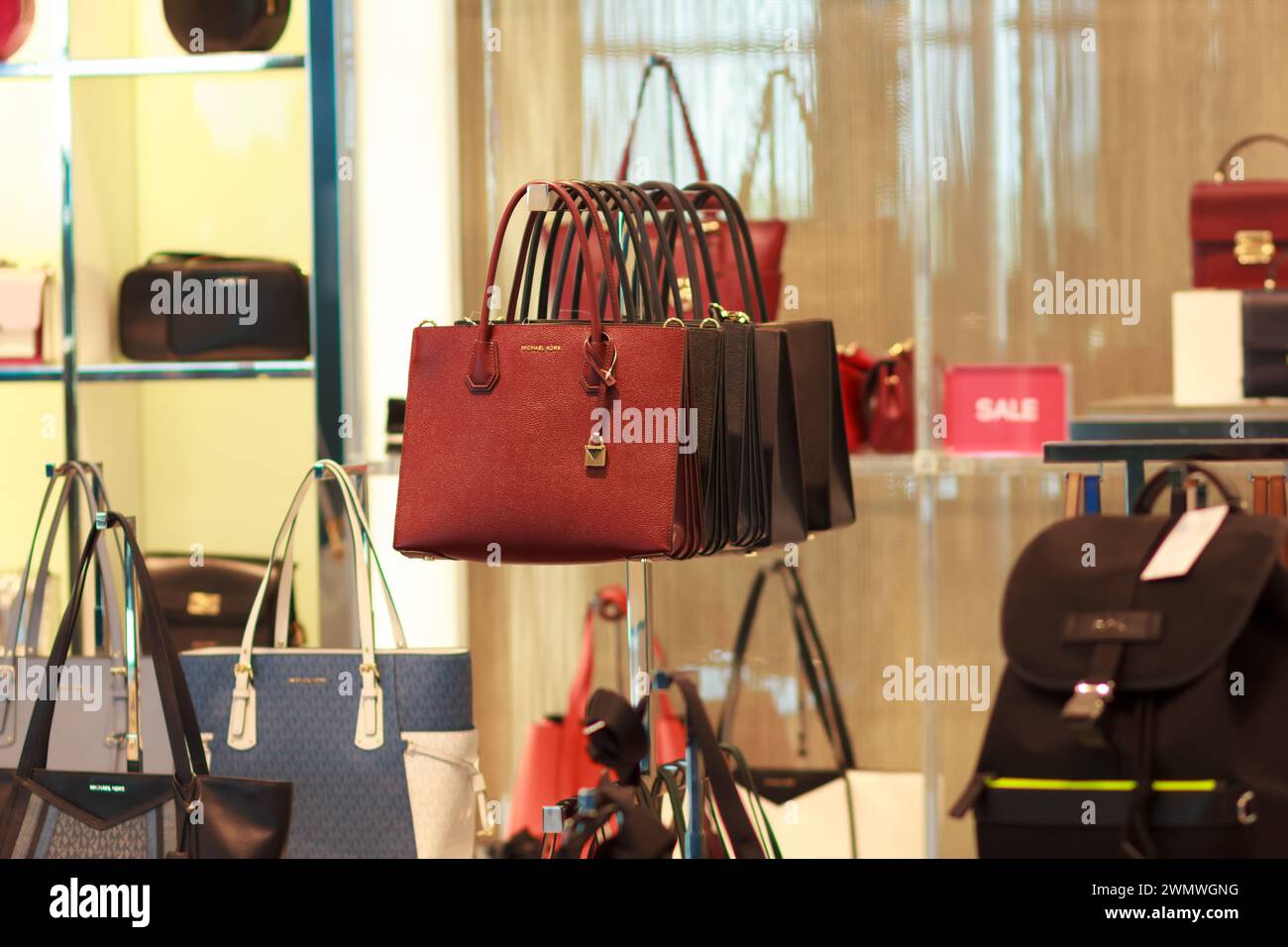 The Brand Shop With Fashionable Luxury Bags Of Michael Kors Collection. Stock Photo