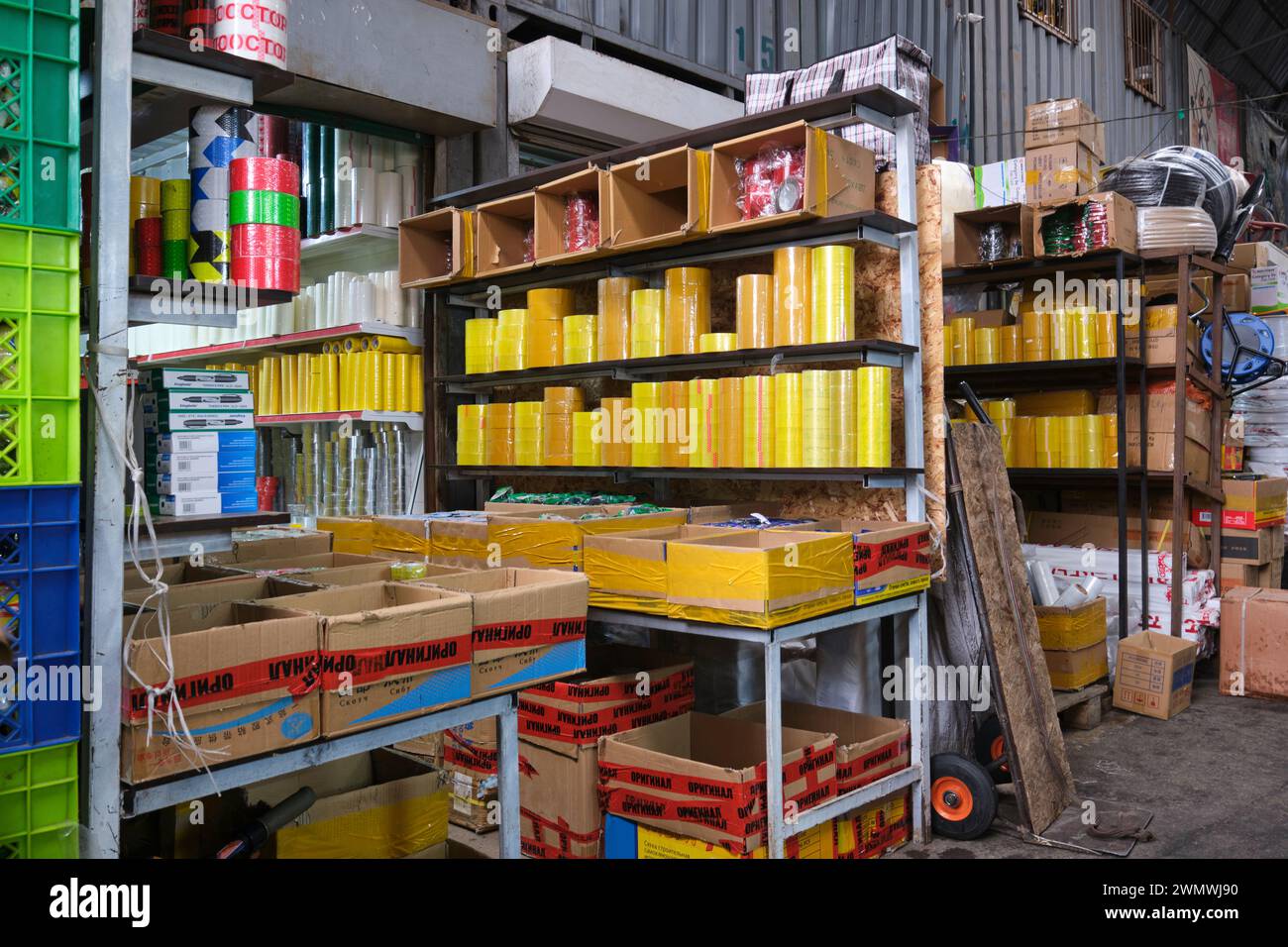 A view of a shop, store that sells many kinds of tape, including clear shipping tape. At the Barakholka shipping container local market in Almaty, Kaz Stock Photo