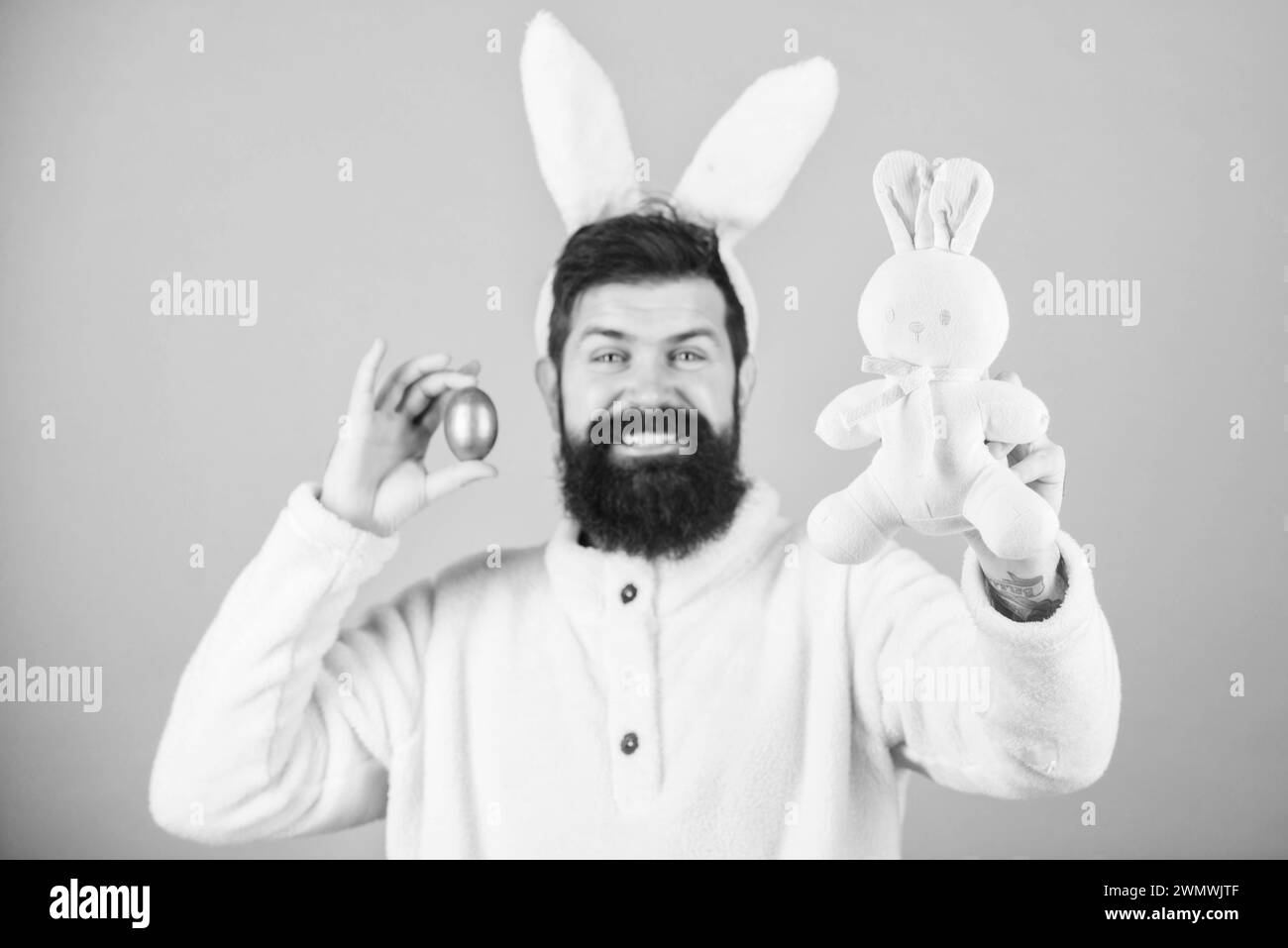 Join celebration. Bearded man wear bunny ears. Easter symbol concept ...