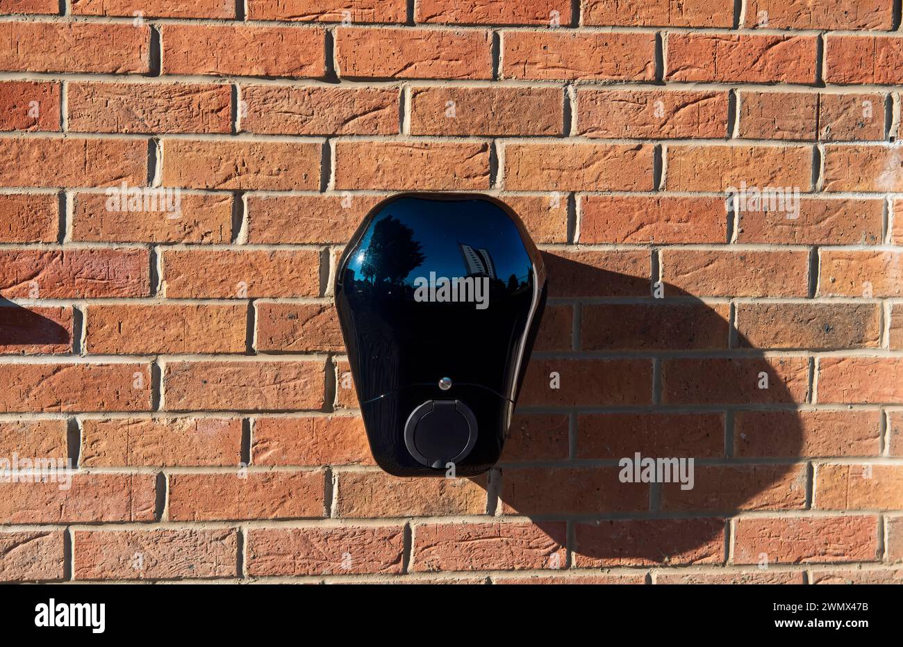 Visual Reference: Private Electric Vehicle Charging Station Fitted To The Face Of