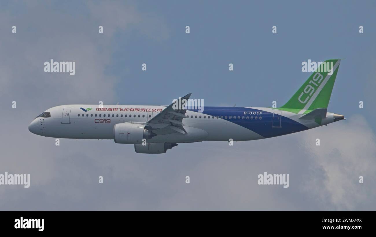 SINGAPORE - FEBRUARY 23, 2024:  China commercial narrow-body aircraft, the COMAC C919 B-001F doing an aerial display at the Singapore Airshow 2024. Stock Photo