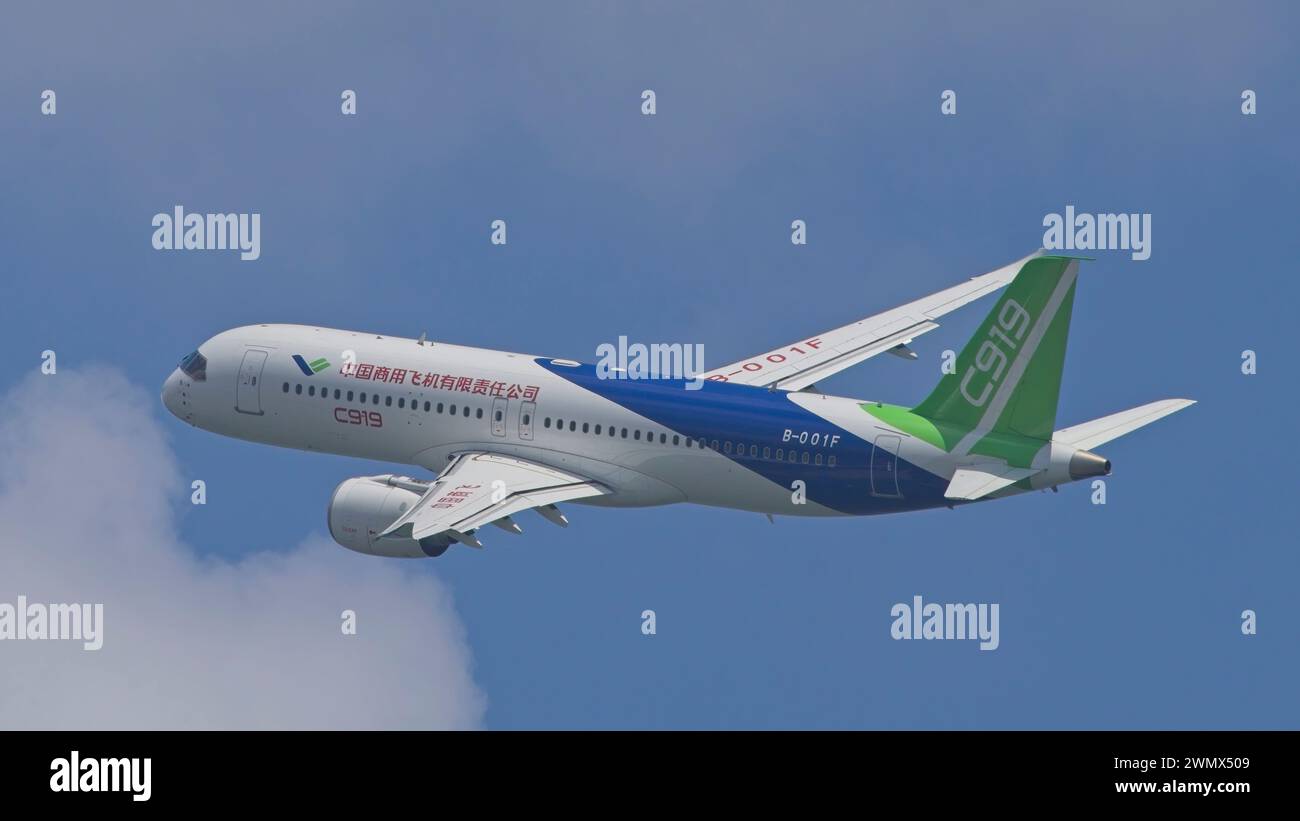 SINGAPORE - FEBRUARY 23, 2024:  China commercial narrow-body aircraft, the COMAC C919 B-001F doing an aerial display at the Singapore Airshow 2024. Stock Photo