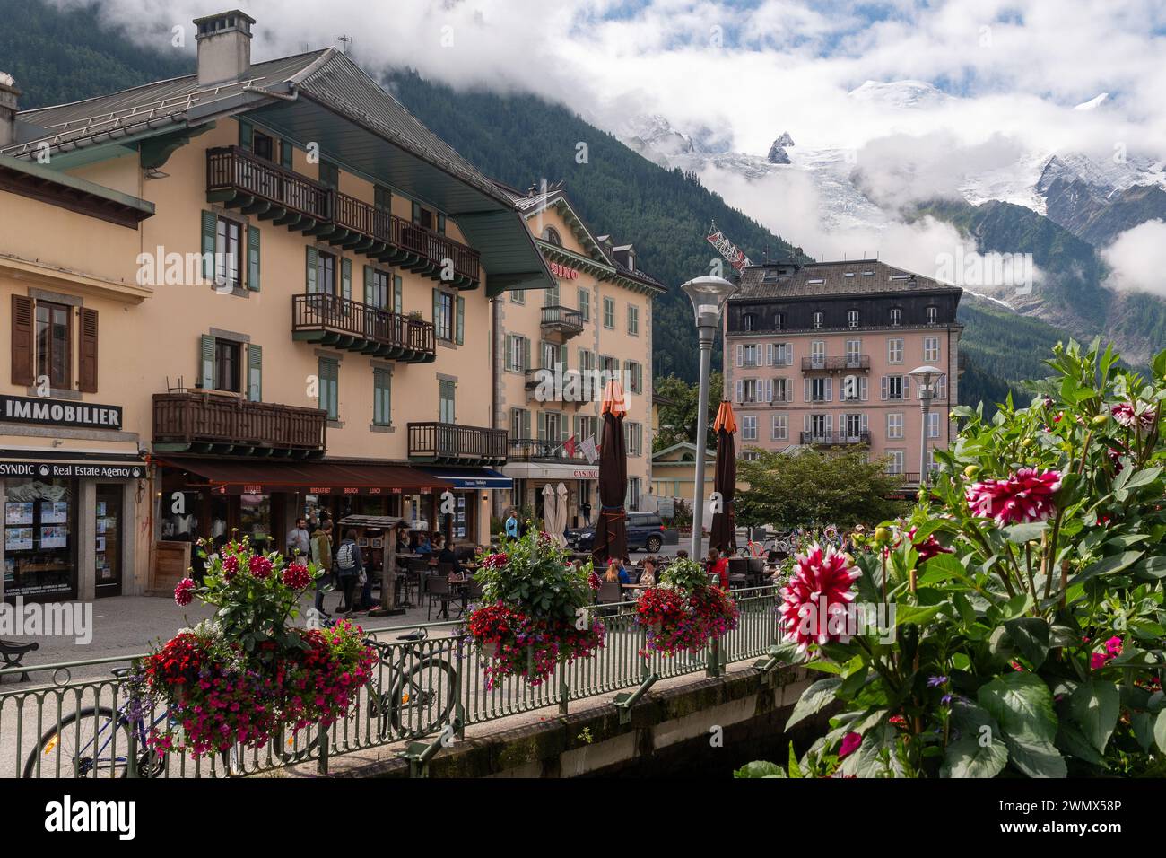 The historic centre of the alpine village with the Mont Blanc massif in the background in summer, Chamonix, Haute Savoie, Auvergne Rhone Alpes, France Stock Photo