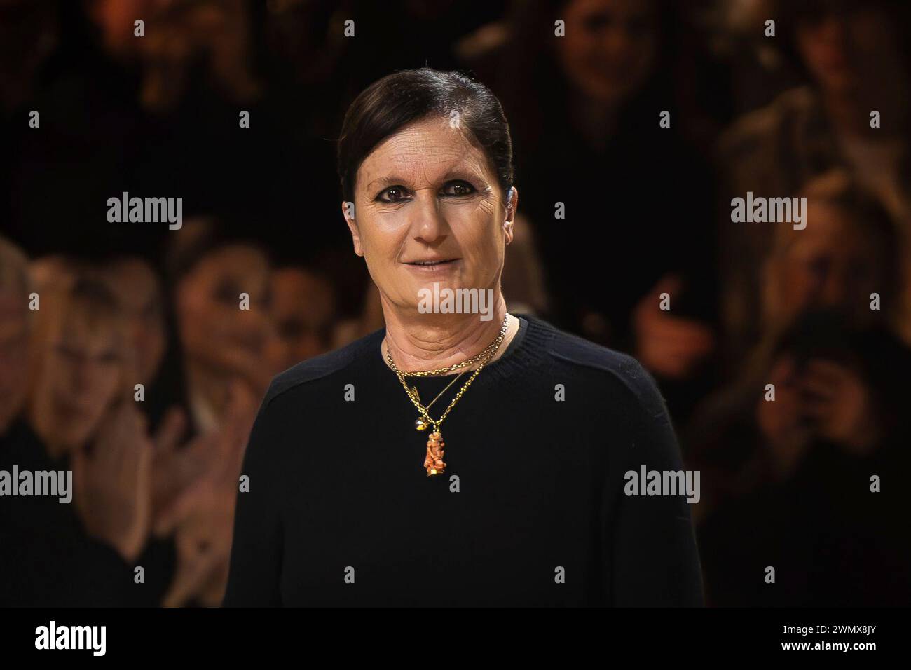Designer Maria Grazia Chiuri accepts applause following the Christian
