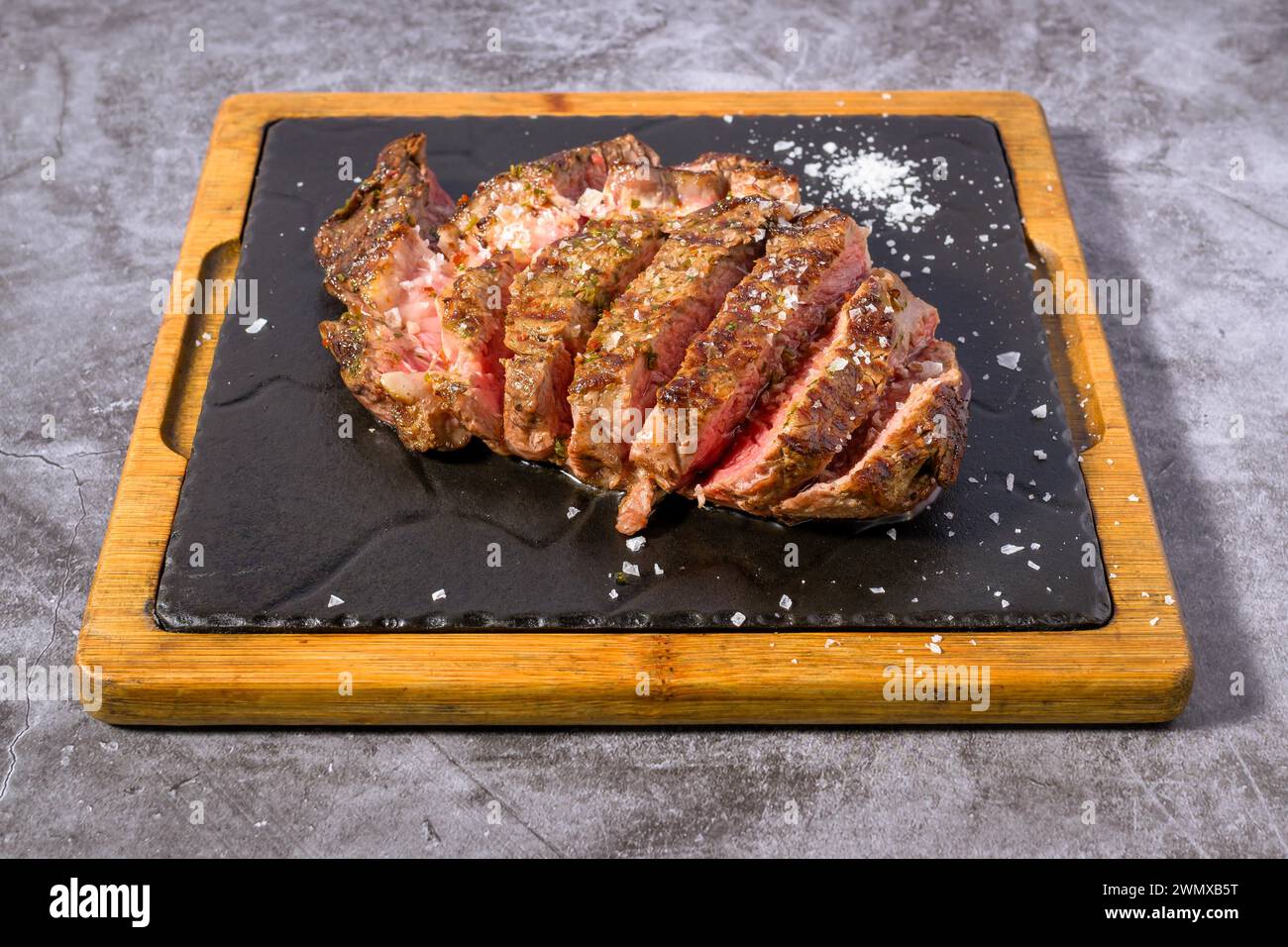 Closeup grilled Argentine beef chorizo bife top view Stock Photo