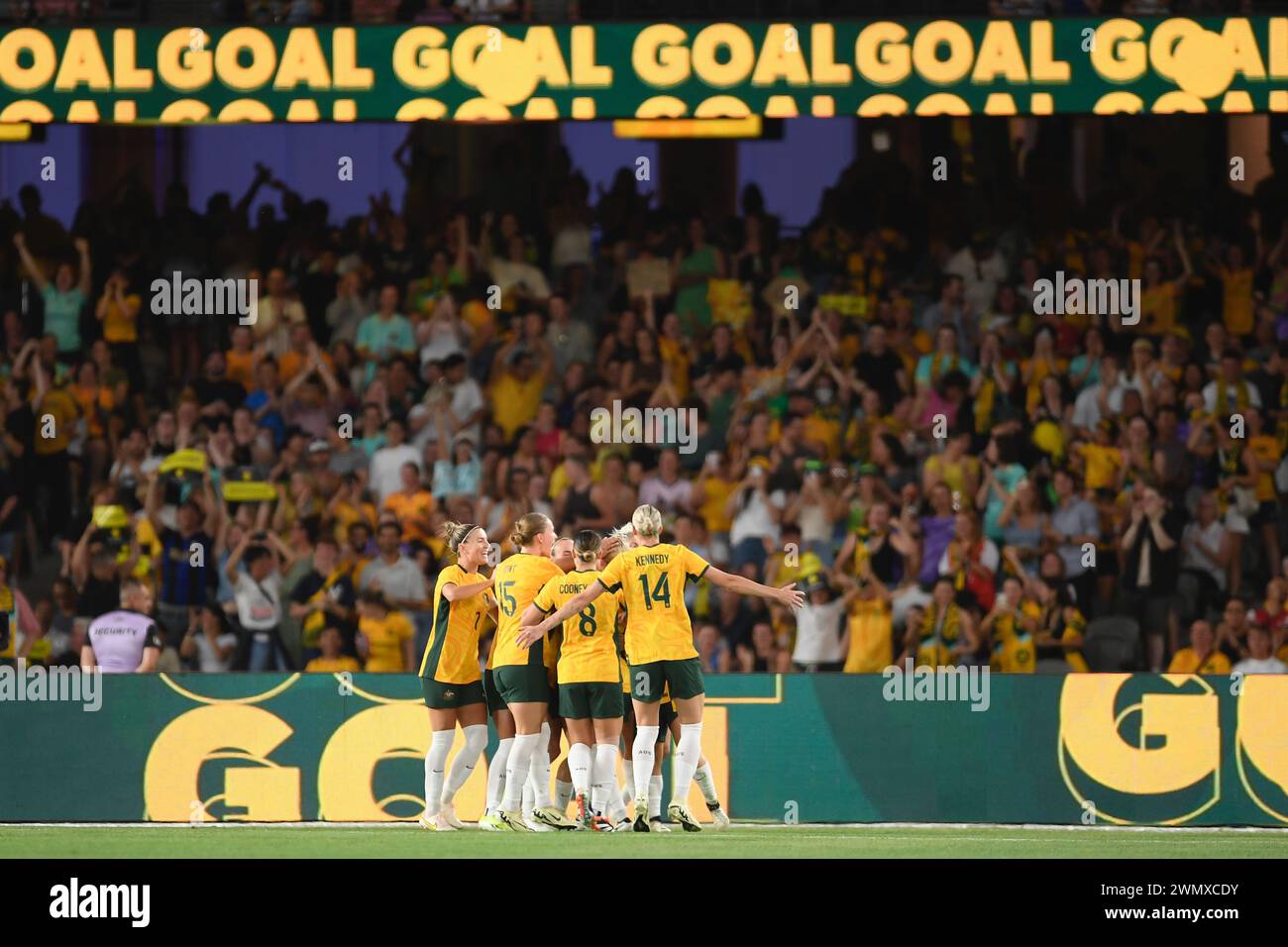 MELBOURNE, AUSTRALIA 28 Feb 2024. Australia back Kaitlyn Torpey plays for San Diego Wave FC scores a goal and the team celebrate during the 2024 AFC Women's Olympic Qualifying Tournament R3 Australia v Uzbekistan at Melbourne's Marvel Stadium. Credit: Karl Phillipson/Alamy Live News Stock Photo