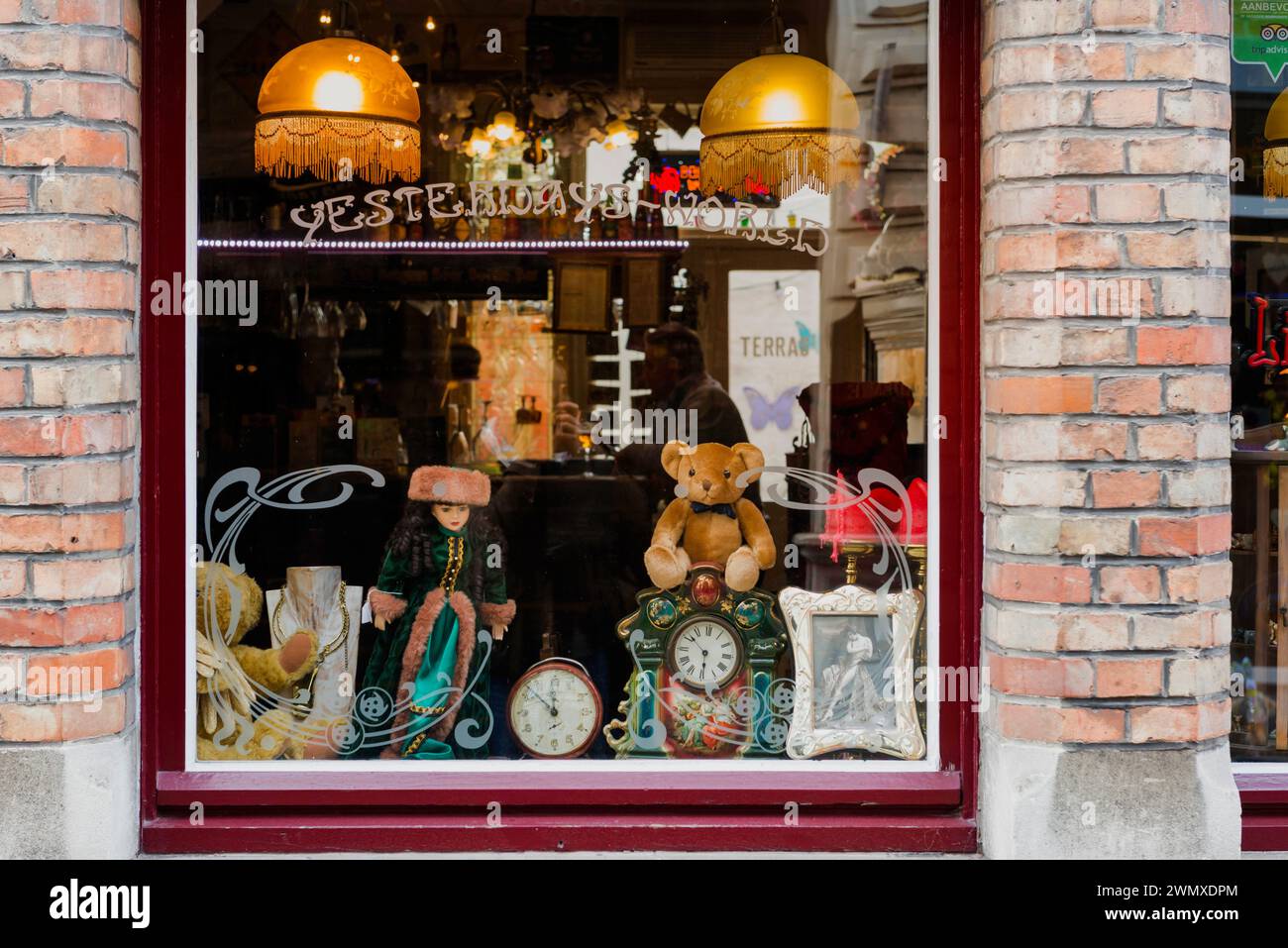Window of a junk shop, vintage, history, junk, old, antique, junk shop, window dressing, Bruges, Belgium Stock Photo