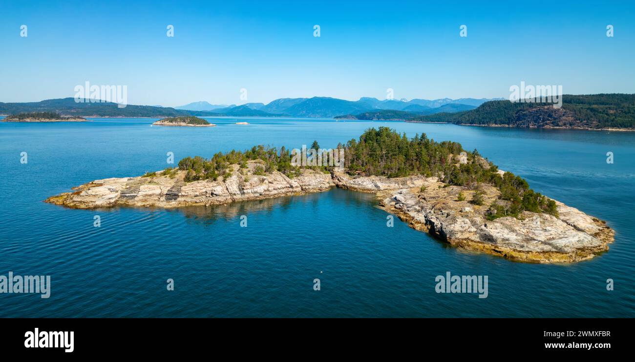 Rocky Island in Strait of Georgia. Powell River, BC, Canada. Stock Photo
