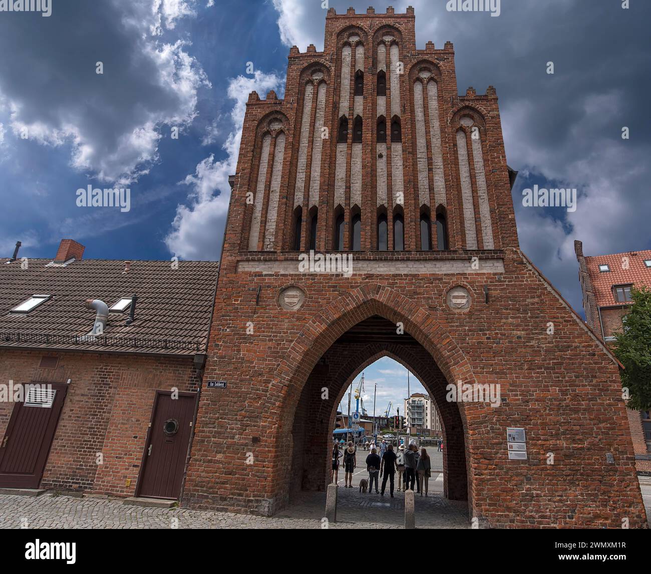 Historic water gate in brick Gothic style built in 1450, Am Hafen 1, Wismar, Mecklenburg-Vorpommern, Germany Stock Photo
