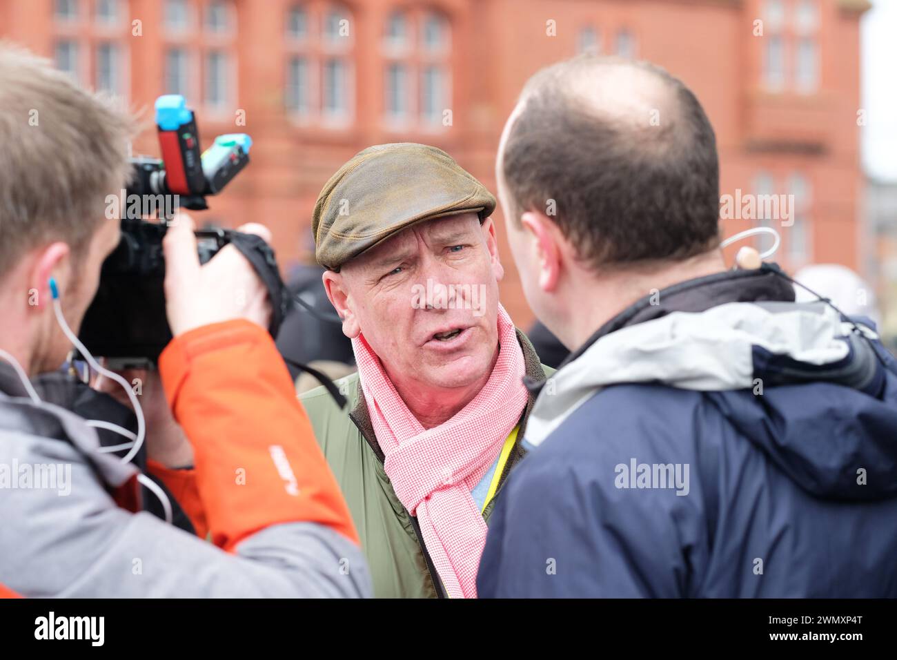 Cardiff, Wales, UK – Wednesday 28th February 2024 – Gareth Wyn Jones ( centre ) farmer and broadcaster joins a Welsh farmers protest against the Welsh government’s proposed Sustainable Farming Scheme ( SFS ).  Photo Steven May / Alamy Live News Stock Photo