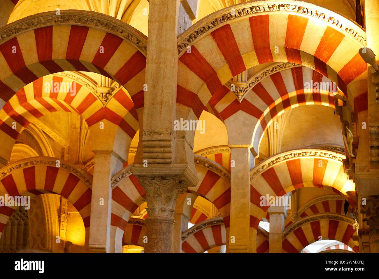 Mosque?Cathedral of Cordoba. The columns and two-tiered arches in the original section of the mosque building. Spain Stock Photo