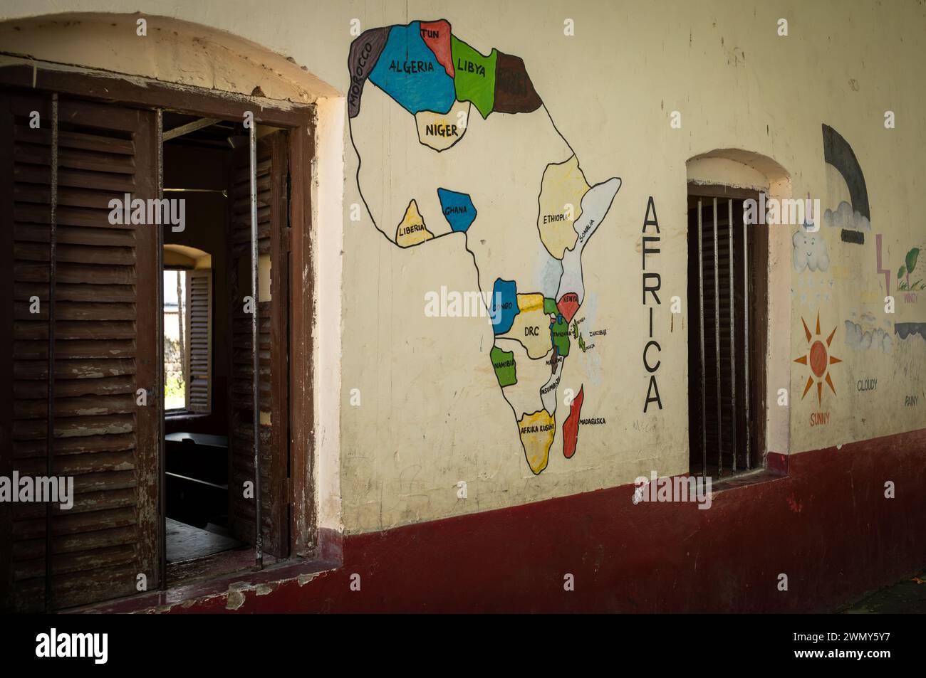 A painted map of Africa on the wall of St Monica School in Stone Town, Zanzibar, Tanzania Stock Photo