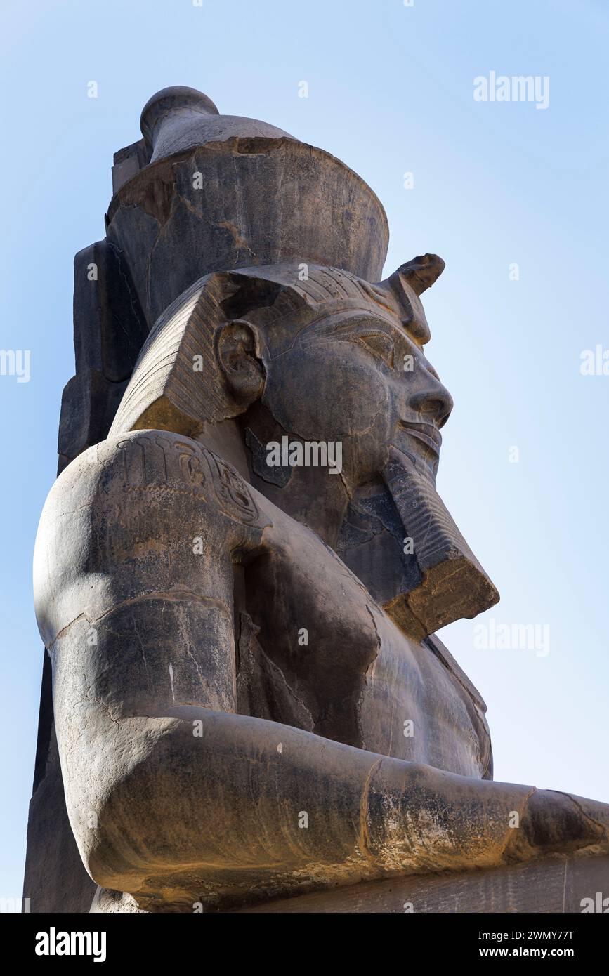 Egypt, Luxor, Ancient Thebes with its Necropolis listed as World Heritage by UNESCO, Luxor Temple, Ramesses II statue Stock Photo