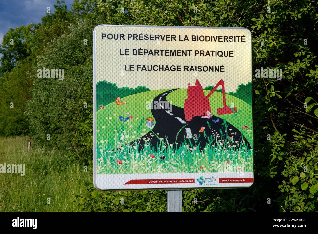 France, Haute Saône, Sign warning of late mowing of roadsides to preserve biodiversity Stock Photo