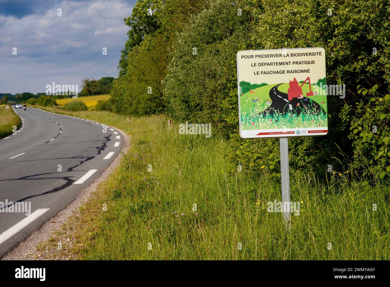 France, Haute Saône, Sign warning of late mowing of roadsides to preserve biodiversity Stock Photo