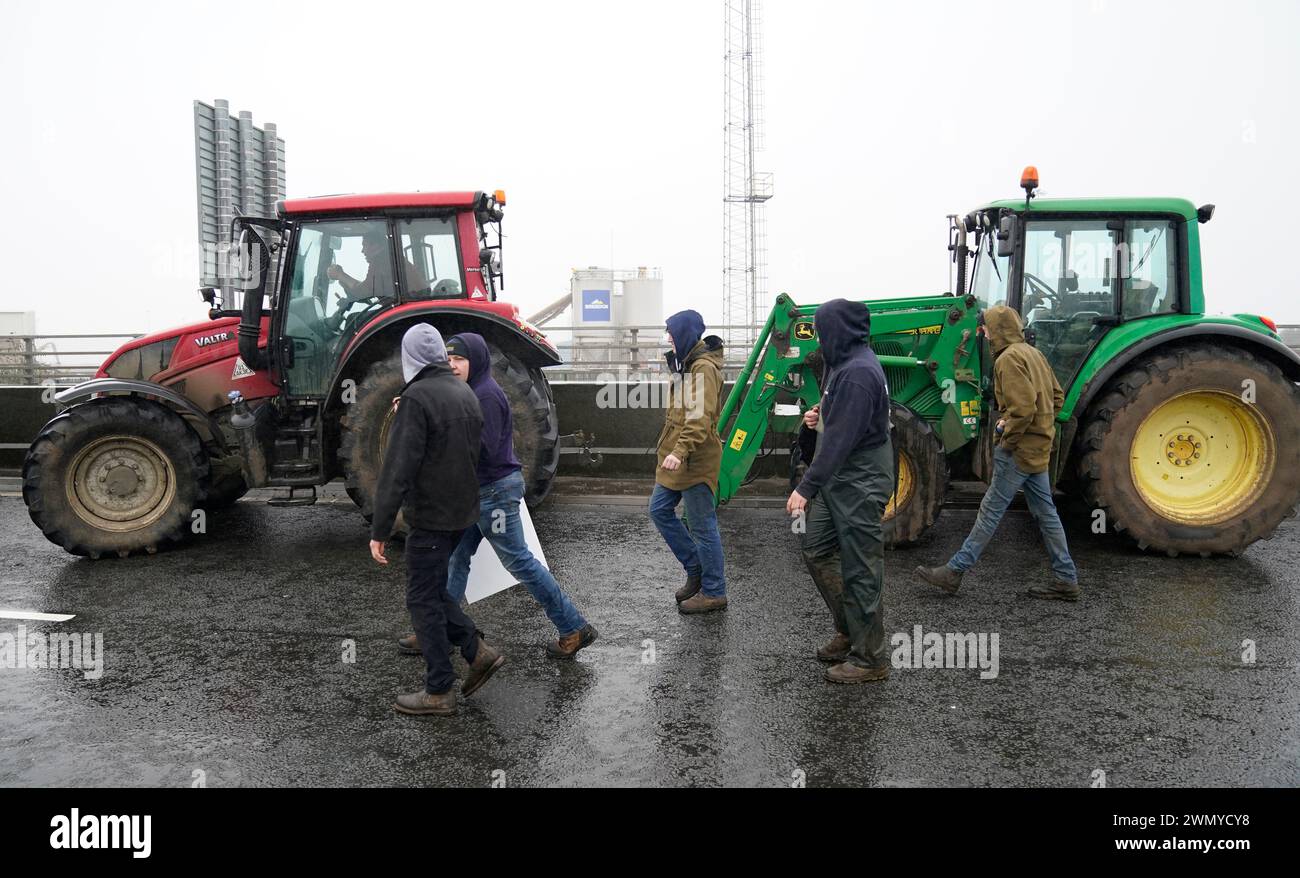 Farmers leave in their tractors which were parked up on the Cardiff Bay