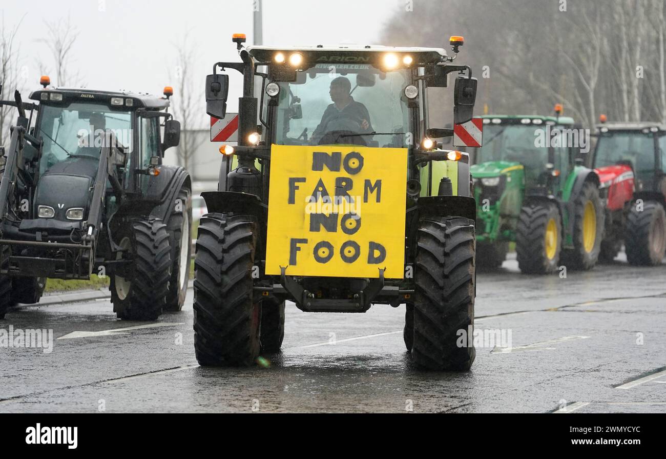 Farmers leave in their tractors which were parked up on the Cardiff Bay