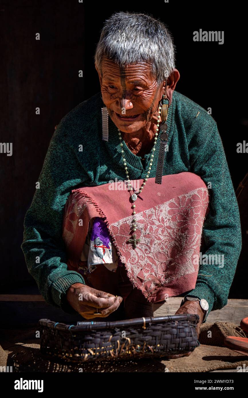 India, Arunachal Pradesh, Lazu village, Nocte tribe, tatooed woman Stock Photo