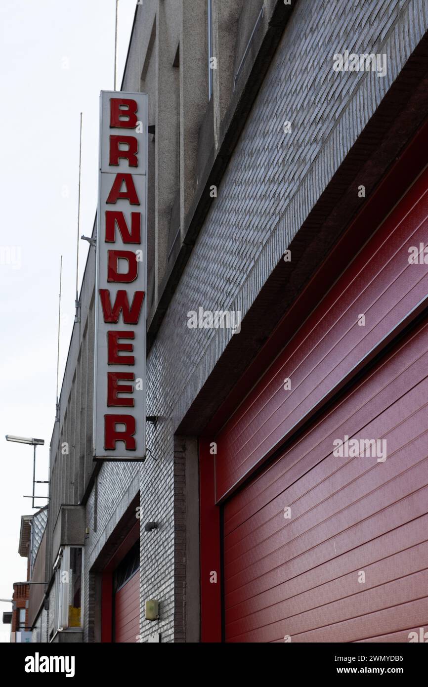 NINOVE, BELGIUM, 29 JANUARY 2024: The outside of a Firestation in Flanders, Belgium, with the words 'Brandweer' (Firebrigade). Illustrative editorial Stock Photo