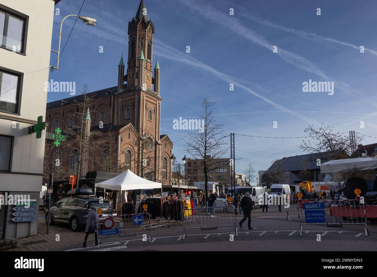 WETTEREN, BELGIUM, 1 FEBRUARY 2024: View of the weekly Thursday market on the main market place in Wetteren. It is one of the many typical street mark Stock Photo