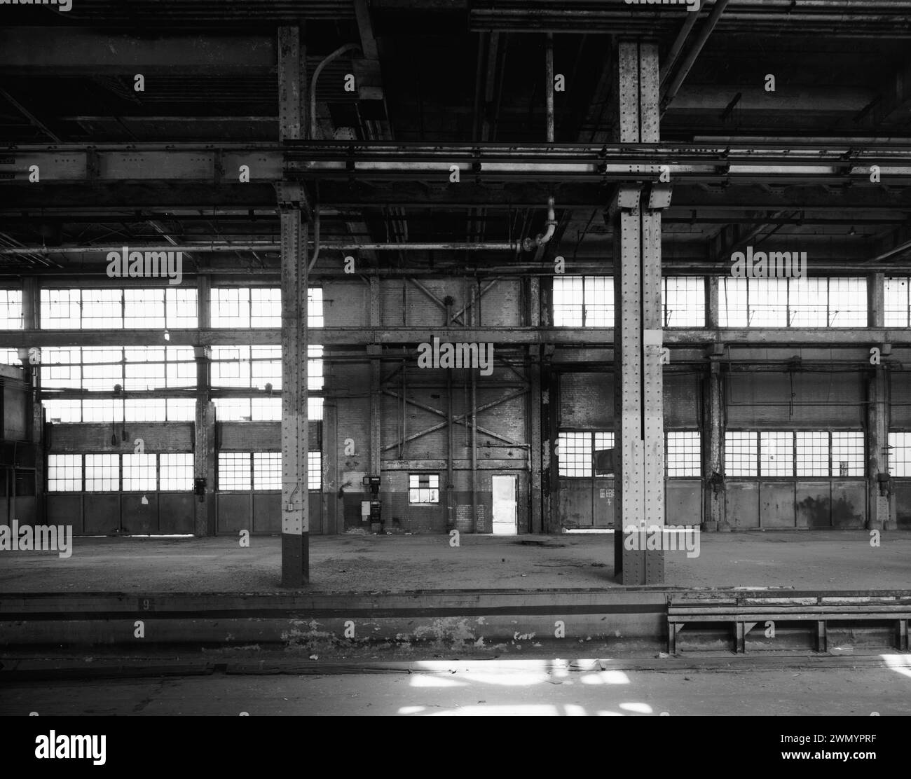 Industrial area vintage building LOOKING EAST ACROSS INTERIOR RAIL