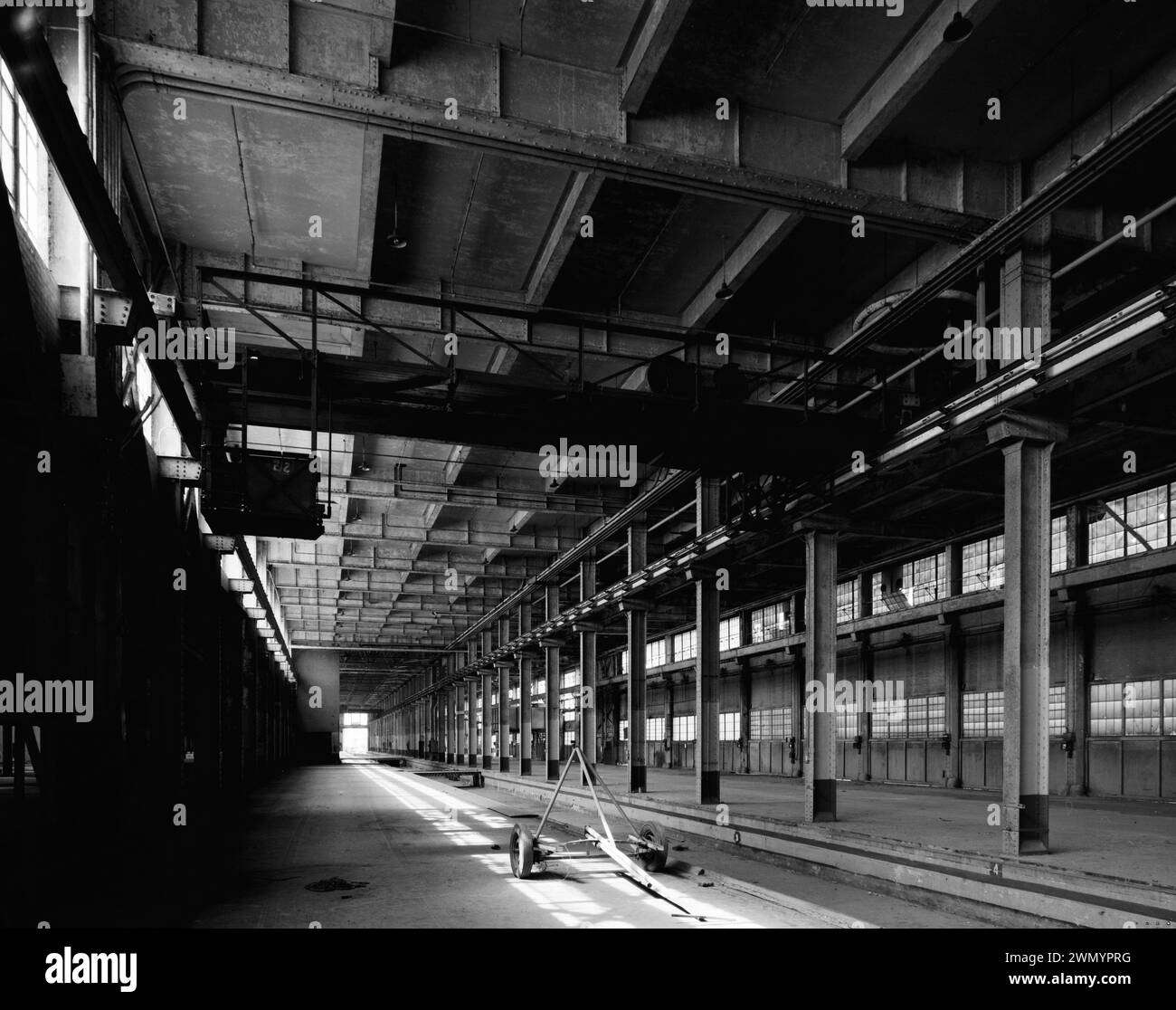 Industrial area - vintage building - Warehouse -  LOOKING NORTH TO CRANE AND FREIGHT ELEVATOR. - Ford Motor Company Long Beach Assembly Plant, Assembly Building, 700 Henry Ford Avenue, Long Beach, Los Angeles County Stock Photo
