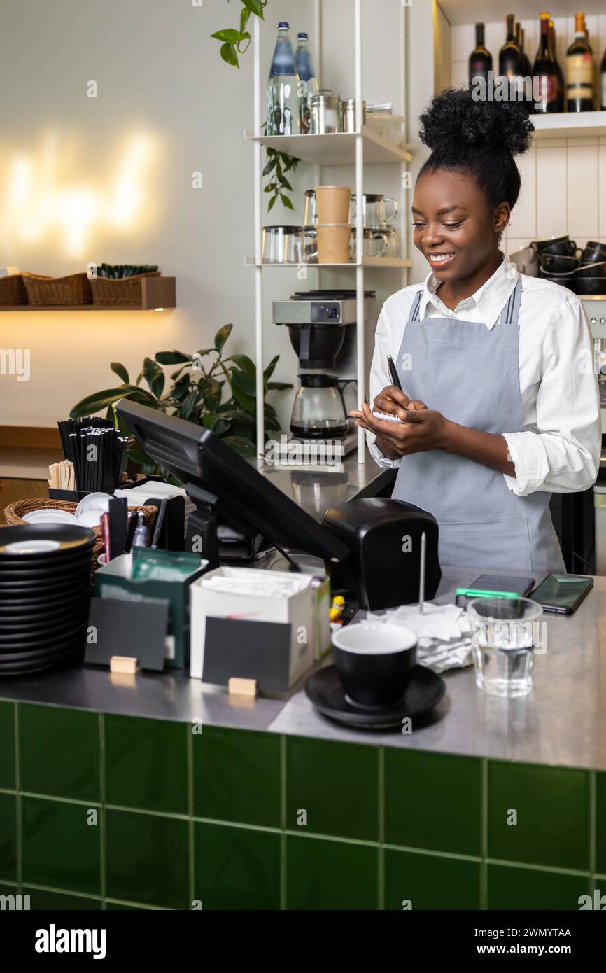 Café staff taking orders hi-res stock photography and images - Alamy