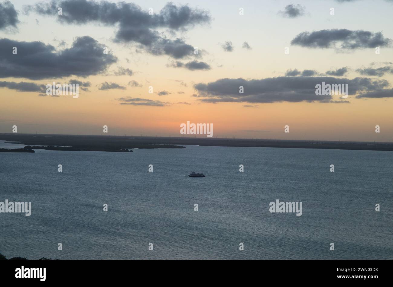 A panoramic view of dramatic sunset over caribbean sea in Cancun, Mexico Stock Photo