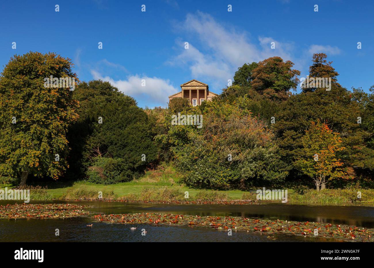 Although the manor house at Castle Ward overlooks the waters of Strangford Lough, in the 18th century it was thought to be de rigueur to have a man-ma Stock Photo