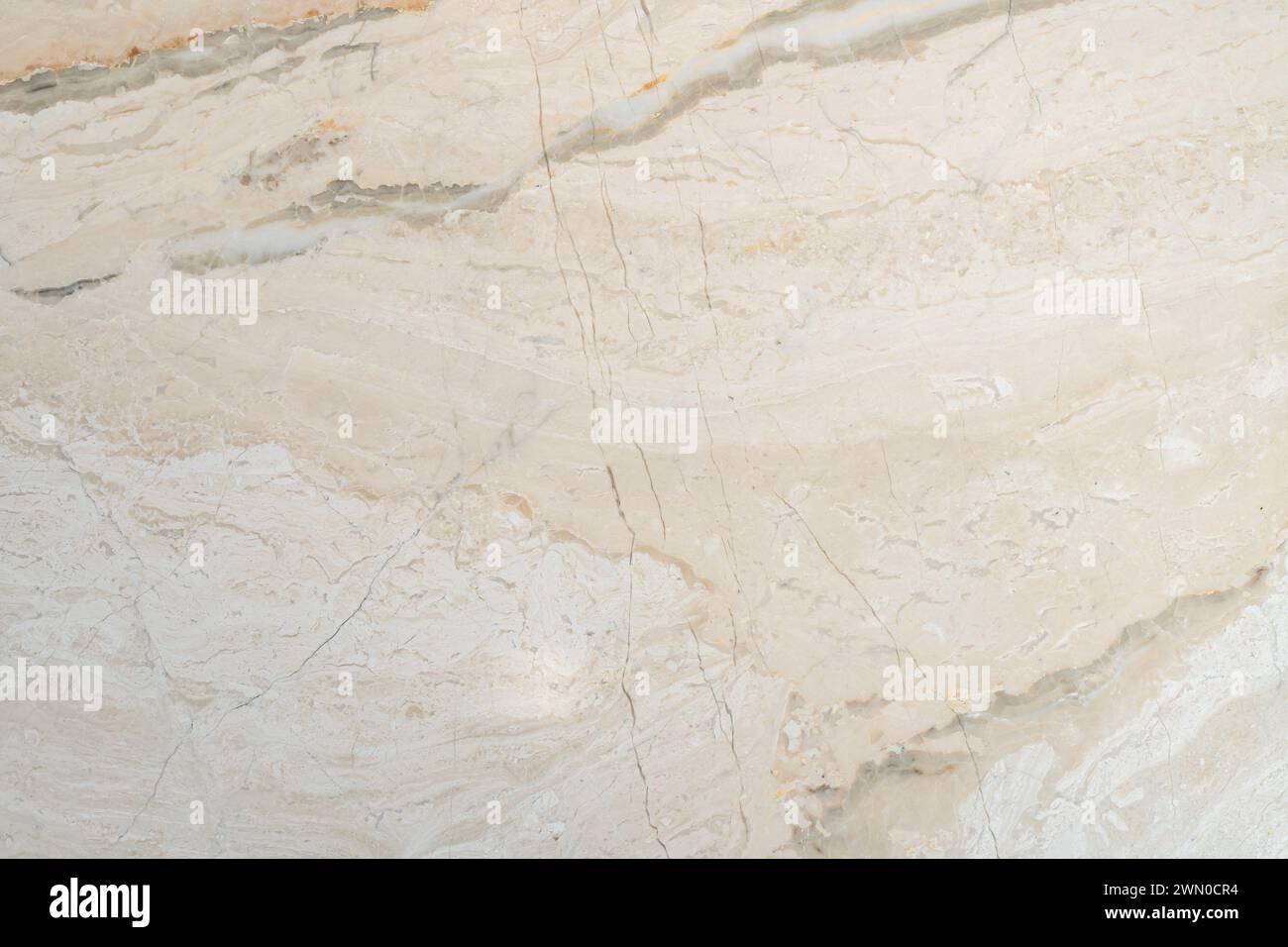 Textured, warm toned, natural marble stone surface Stock Photo