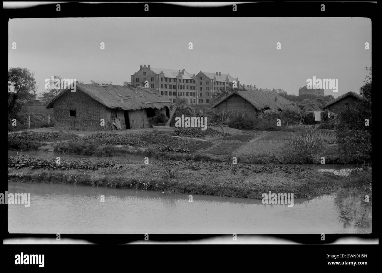 Rustic buildings in foreground, brick buildings in background. Rustic ...