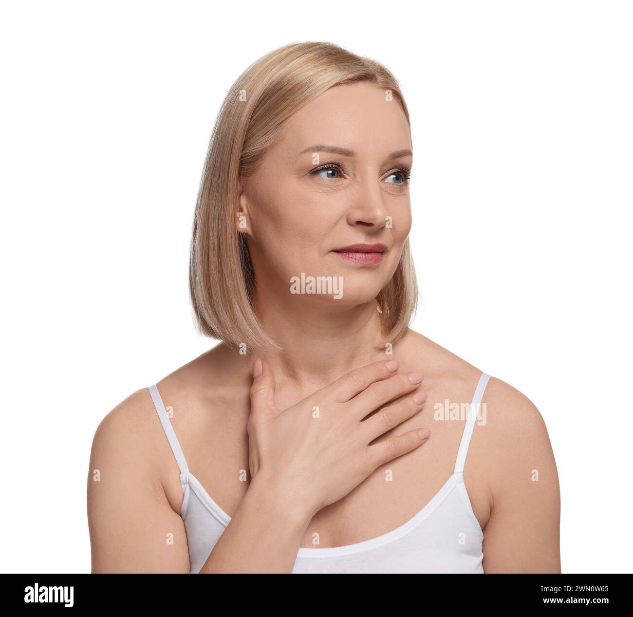 Beautiful woman touching her neck on white background Stock Photo - Alamy