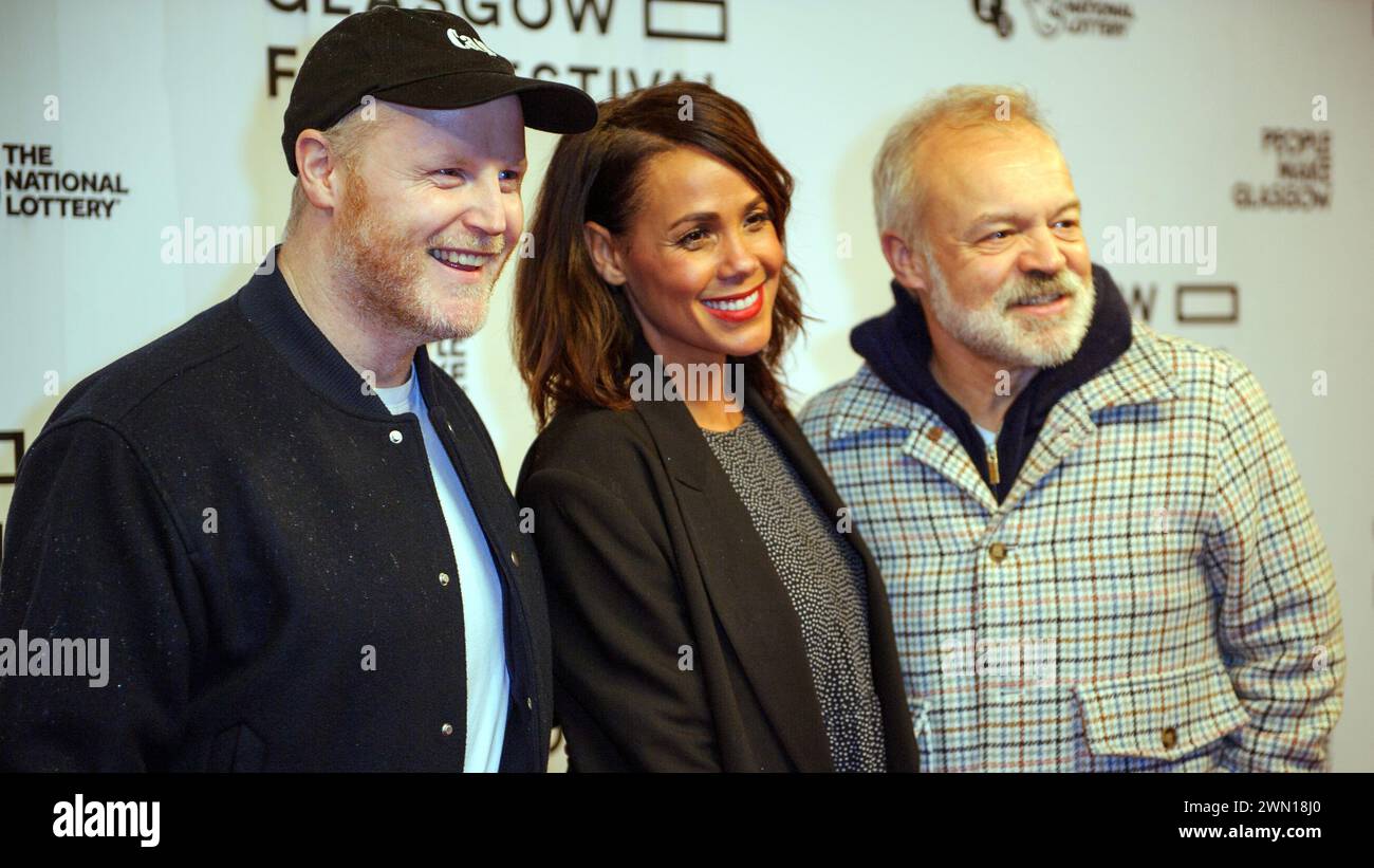 Glasgow, Scotland, UK. 28th Feb, 2024. Actor, Gary Lamont, TV presenter, Jean Johansson, and comedian, Graham Norton, on the red carpet. Glasgow Film Festival 2024 (GFF) has opened at the Glasgow Film Theatre (GFT), this evening, with a screening of Love Lies Bleeding. This was the UK premiere of the film, which was written by Rose Glass and Weronika Tofilska, and directed by Glass. GFF runs until 10th March, 2024. Credit: Stewart Kirby for #creativezealots/Alamy Live News Stock Photo