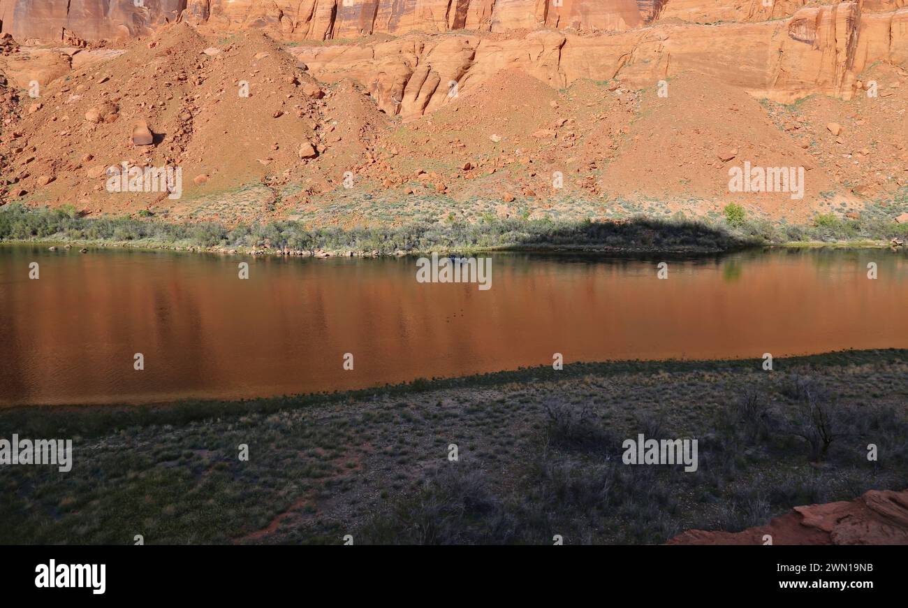 A fishing boat on the Colorado river on the north half of Horseshoe Bend.  Located just outside of Page, Arizona. Stock Photo